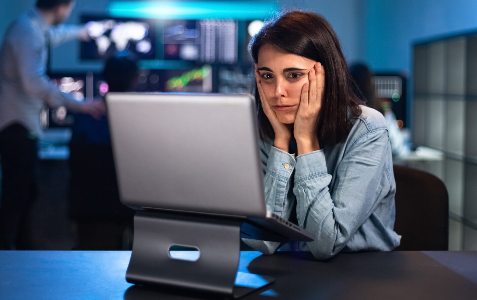 Frustrated tired and scared female financial analyst after seeing investment results.